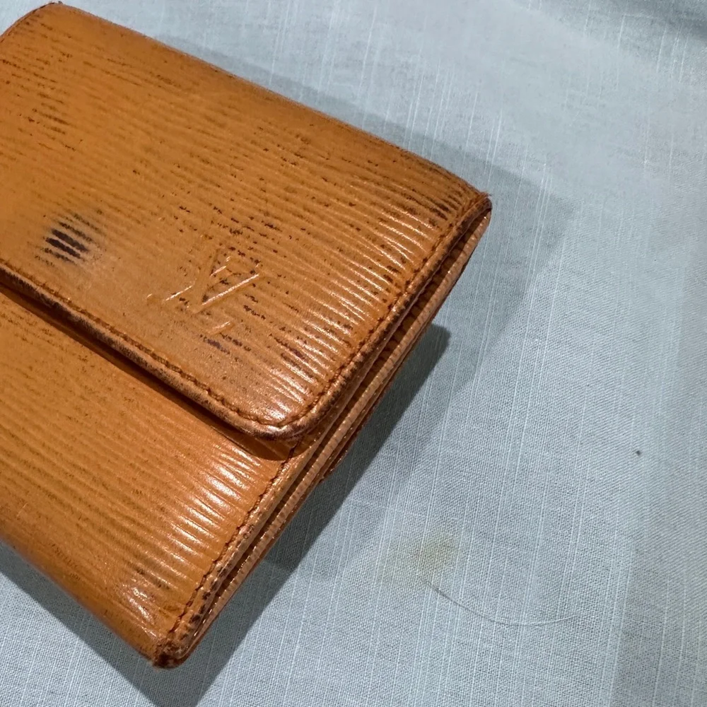 AUTHENTIC Louis Vuitton wallet. Tassel yellow.